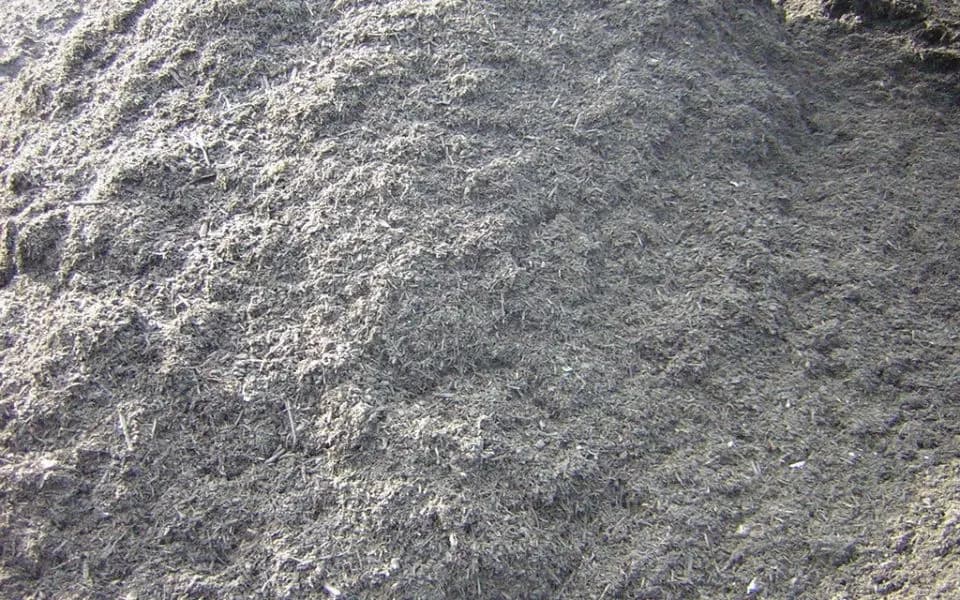 Close-up van donkere compost